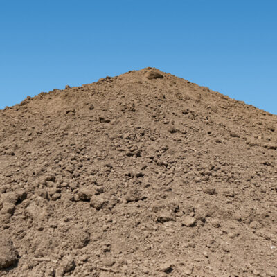 Large Pile of Dirt against Sky
